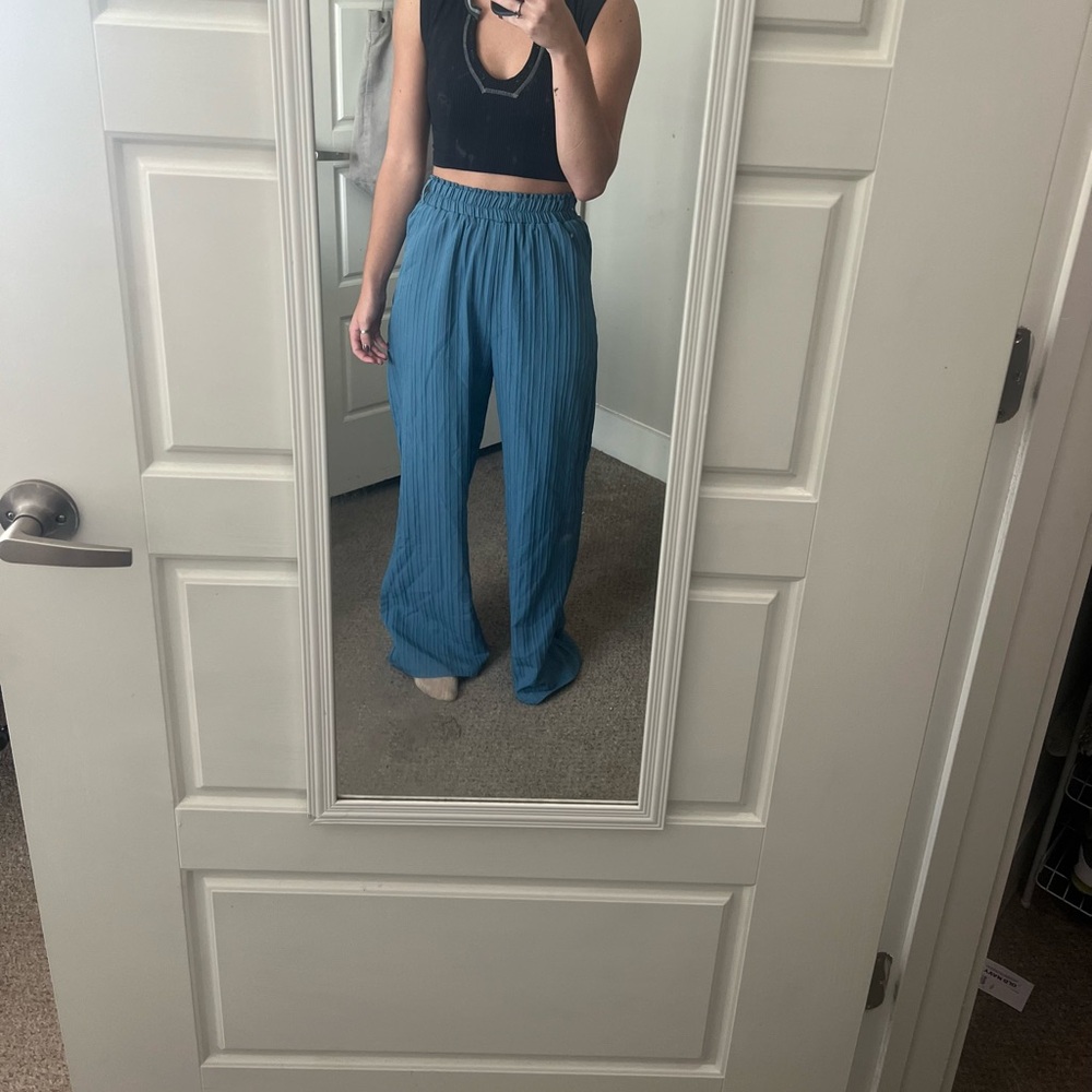 Blue ribbed pants professional or casual.